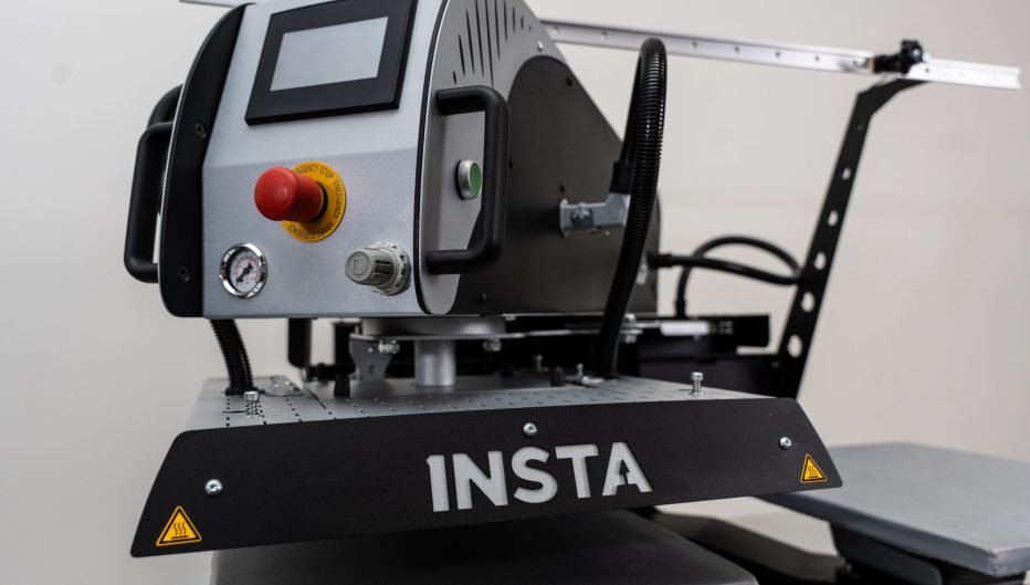 Insta Graphic Systems industrial heat press machine with digital controls and precision platen for heat transfer printing