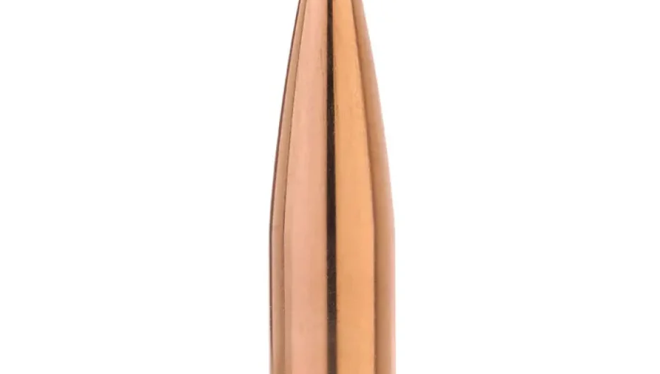 Close-up product image of a Sierra Bullets rifle projectile available from Precision Reloading featuring a copper jacket with a green polymer tip on a white background