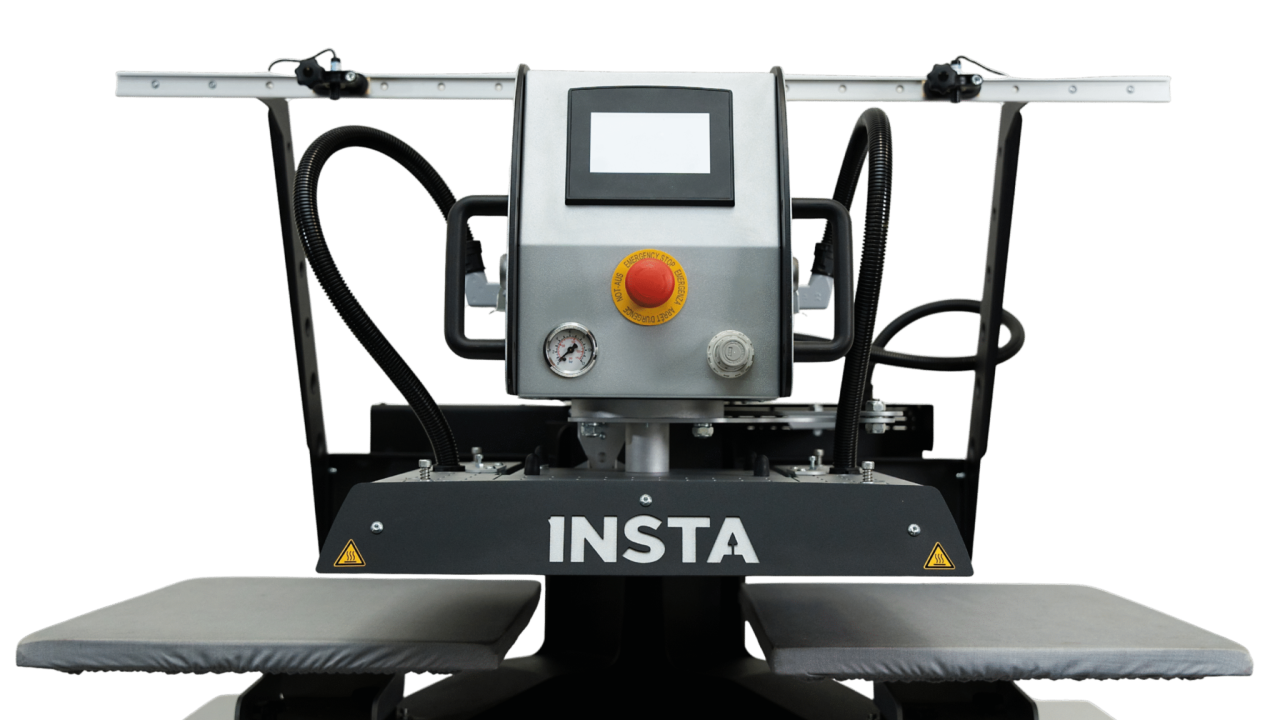 Front view of an Insta Graphic Systems dual-platen automatic heat press with touchscreen controls and two workstations